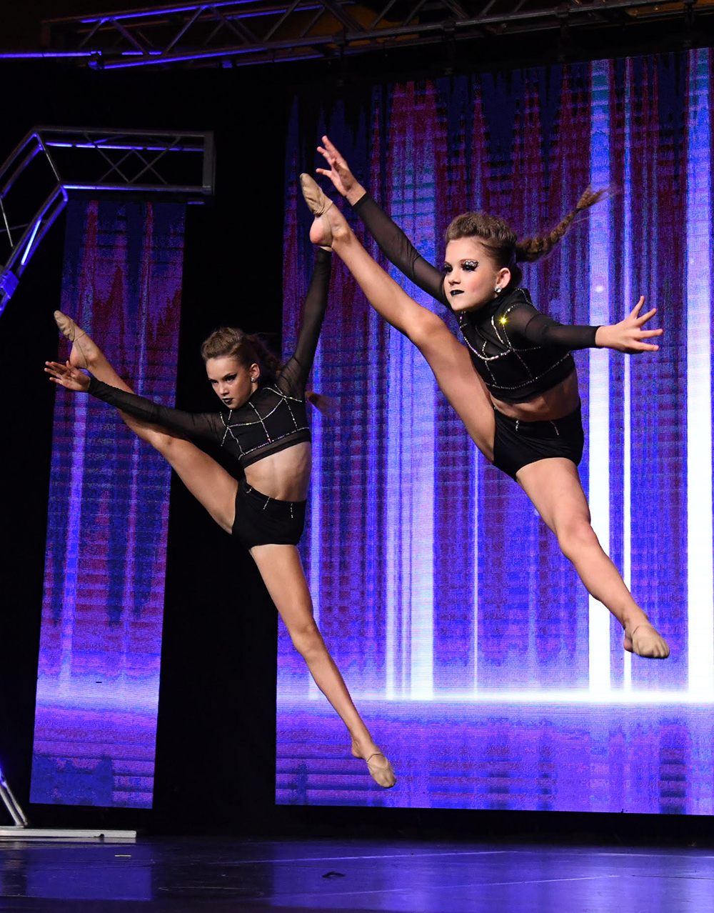 Acro Dancers in Action dressed in black