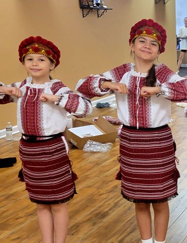 2 young Ukrainian girls in their ethnic clothing